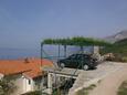 Parking lot Brela, Makarska, Parking lot 2653 - Apartments with pebble beach.