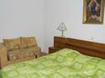 Promajna, Dormitorio in the studio-apartment, air condition available y WiFi.