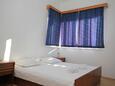 Bedroom 2 Baška Voda, Bedroom 2 in the apartment, air condition available, (pet friendly) and WiFi.