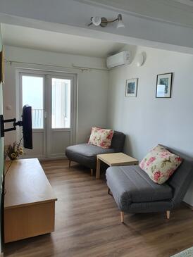 Tučepi, Living room in the apartment, air condition available and WiFi.