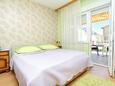 Bedroom Omiš, Bedroom in the apartment, air condition available and WiFi.