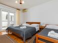 Ložnice Omiš, Ložnice v ubytování typu studio-apartment, s klimatizací a WiFi.