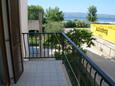 Balcony 1 Duće, Balcony 1 in the room, with a sea view and WiFi.