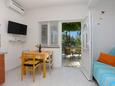 Dining room Lokva Rogoznica, Dining room in the apartment, air condition available, (pet friendly) and WiFi.