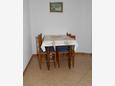 Dining room Duće, Dining room in the apartment.