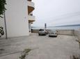 Parking lot Duće, Omiš, Parking lot 2767 - Apartments near sea with pebble beach.