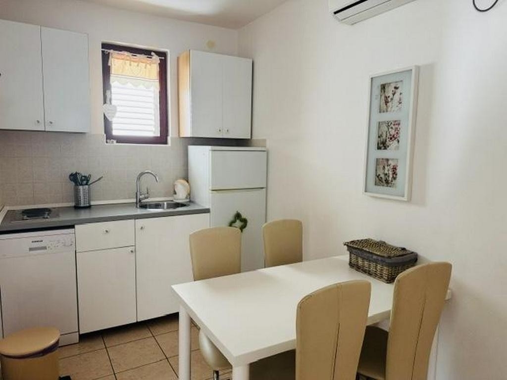 Appartement de deux chambres avec la terrasse et la vue sur le mer Pag (A-27835-c)