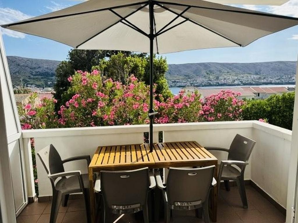 Appartement de deux chambres avec la terrasse et la vue sur le mer Pag (A-27835-c)