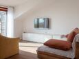 Living room Podgora, Living room in the apartment, air condition available and WiFi.
