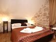 Ložnice Orebić, Ložnice v ubytování typu room, s klimatizací a WiFi.