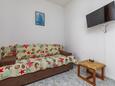 Living room Duće, Living room in the apartment, air condition available and WiFi.