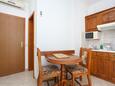 Stanići, Dining room in the apartment, air condition available and WiFi.