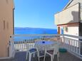 Stanići, Terrace in the apartment, with a sea view and WiFi.