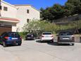 Parking lot Duće, Omiš, Parking lot 2821 - Apartments near sea with sandy beach.