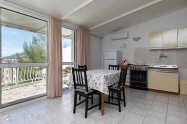 Nemira, Dining room in the apartment, air condition available, (pet friendly) and WiFi.