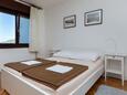 Nemira, Bedroom in the studio-apartment, (pet friendly) and WiFi.