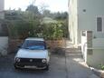 Parking lot Supetar, Brač, Parking lot 2835 - Apartments with pebble beach.