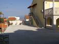 Parking lot Supetar, Brač, Parking lot 2852 - Apartments with pebble beach.