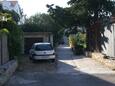 Parking lot Supetar, Brač, Parking lot 2856 - Apartments with pebble beach.