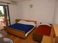 Ložnice Supetar, Ložnice v ubytování typu apartment, s klimatizací.
