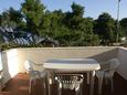 Terrace Supetar, Terrace in the apartment, with a sea view.