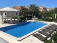 Courtyard Bol, Brač, Courtyard 2874 - Apartments with pebble beach.