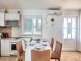 Dining room Rogoznica, Dining room in the apartment, air condition available, (pet friendly) and WiFi.