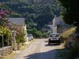 Parking lot Postira, Brač, Parking lot 2909 - Apartments near sea with pebble beach.