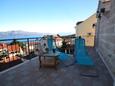 Terrace Postira, Terrace in the apartment, with a sea view and WiFi.