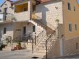 Parking lot Postira, Brač, Parking lot 2910 - Apartments with pebble beach.