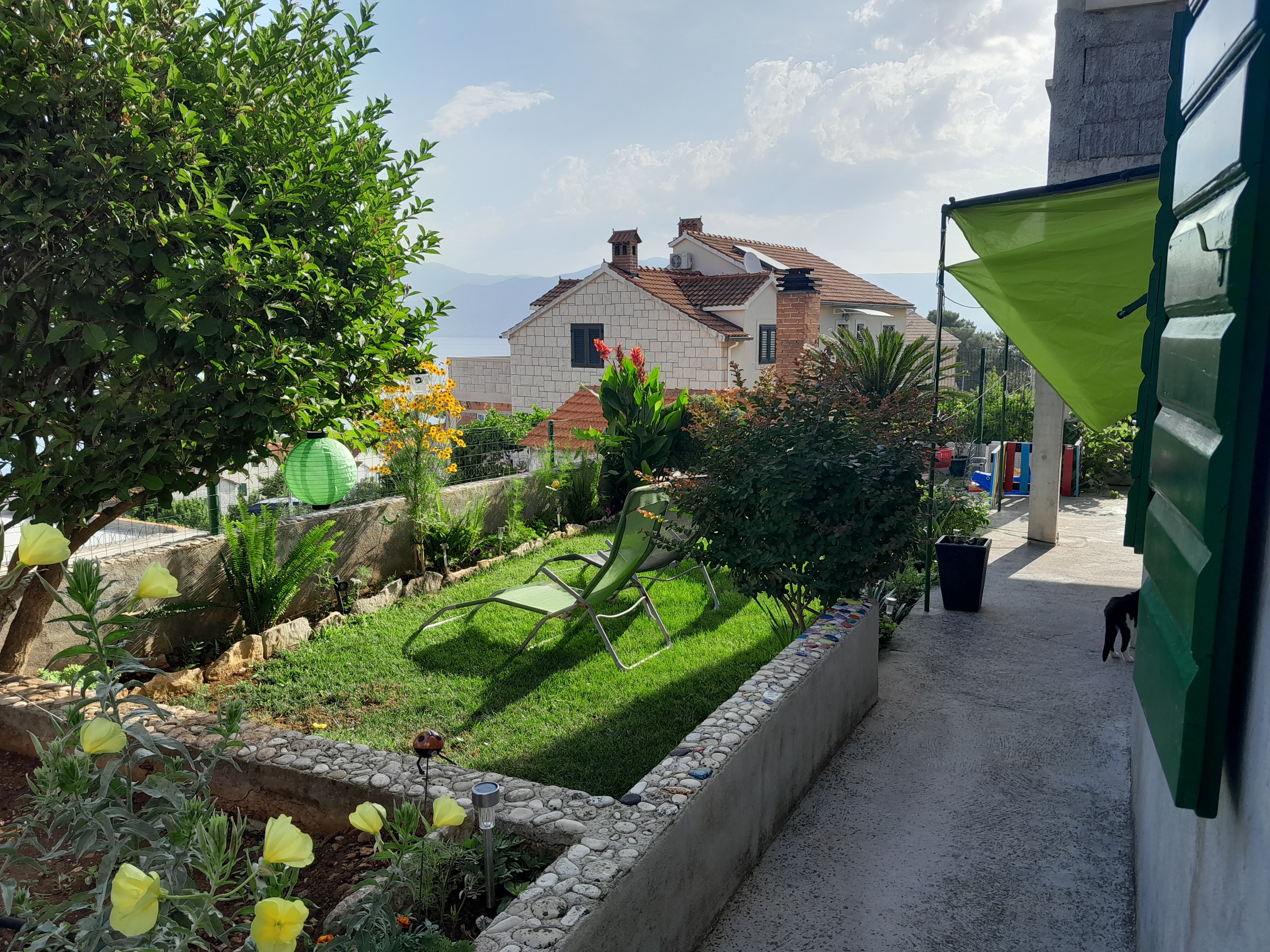 Two bedroom apartment with terrace and sea view Postira, Brač  A-b