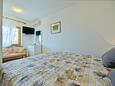 Bedroom Postira, Bedroom in the apartment, air condition available, (pet friendly) and WiFi.