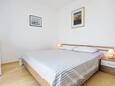 Postira, Bedroom in the apartment, air condition available and WiFi.
