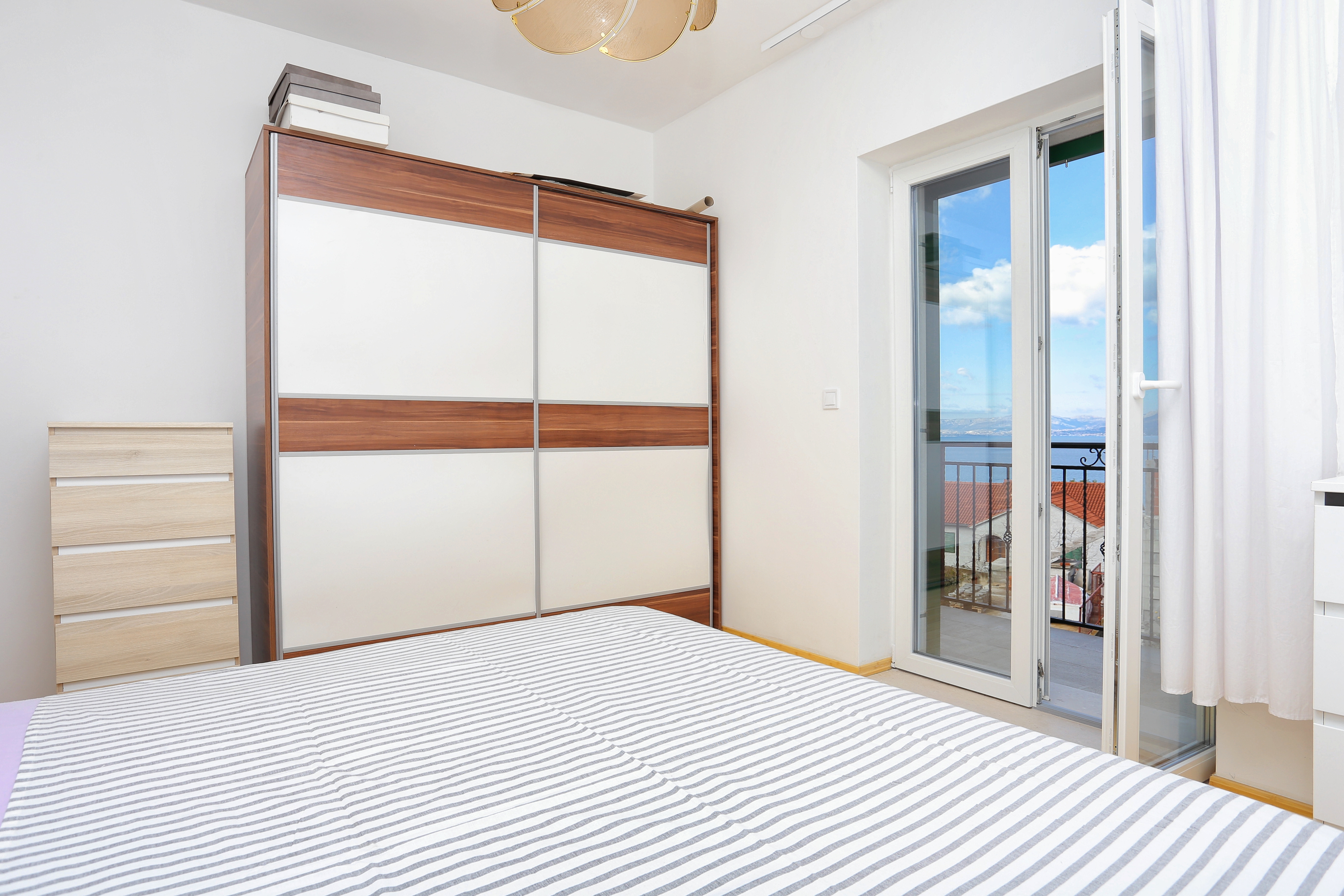 One bedroom apartment with terrace and sea view Postira, Brač  A-c