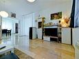 Postira, Living room in the apartment, air condition available and WiFi.
