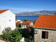 Postira, Terrace - view in the apartment, (pet friendly) and WiFi.