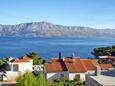 Postira, Terrace - view in the apartment, (pet friendly) and WiFi.