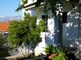 Postira, Brač, Courtyard 2919 - Apartments with pebble beach.