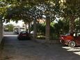 Parking lot Supetar, Brač, Parking lot 2945 - Apartments with pebble beach.