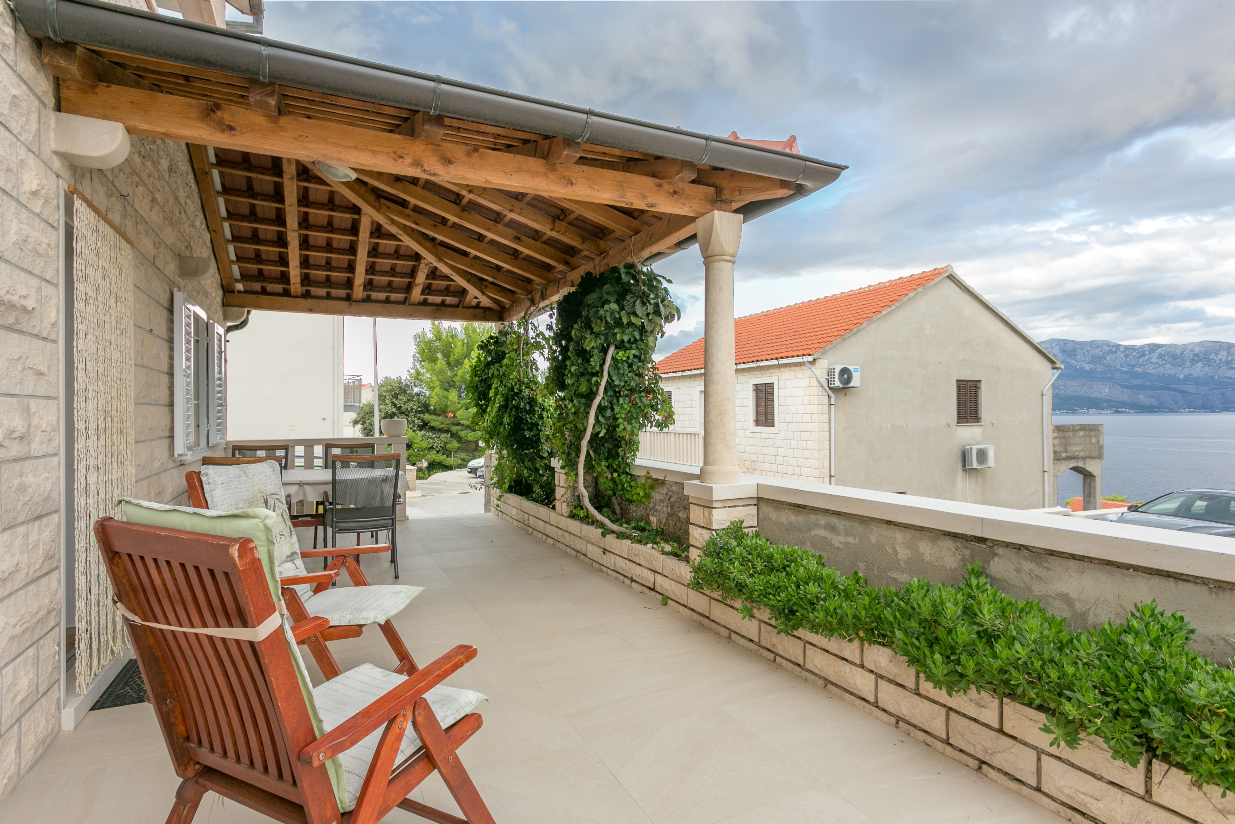 Two bedroom apartment with terrace and sea view Postira, Brač  A-b