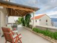 Terrace Postira, Terrace in the apartment, with a sea view and WiFi.