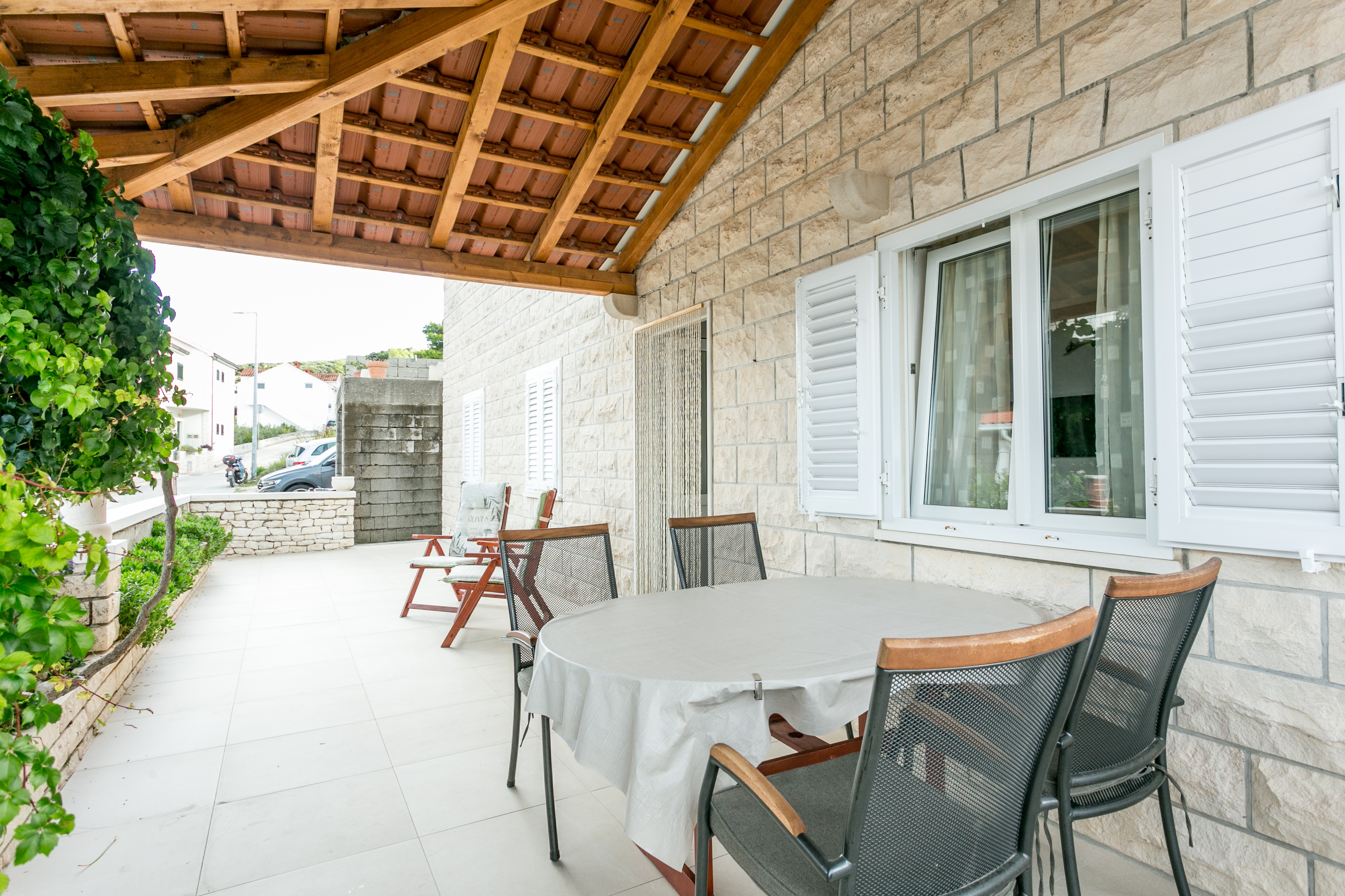 Two bedroom apartment with terrace and sea view Postira, Brač  A-b