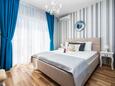 Spavaća soba Lokva Rogoznica, Spavaća soba u smještaju tipa room, dostupna klima i WiFi.