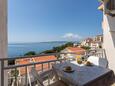 Baška Voda, Balcony in the studio-apartment, with a sea view, (pet friendly) and WiFi.