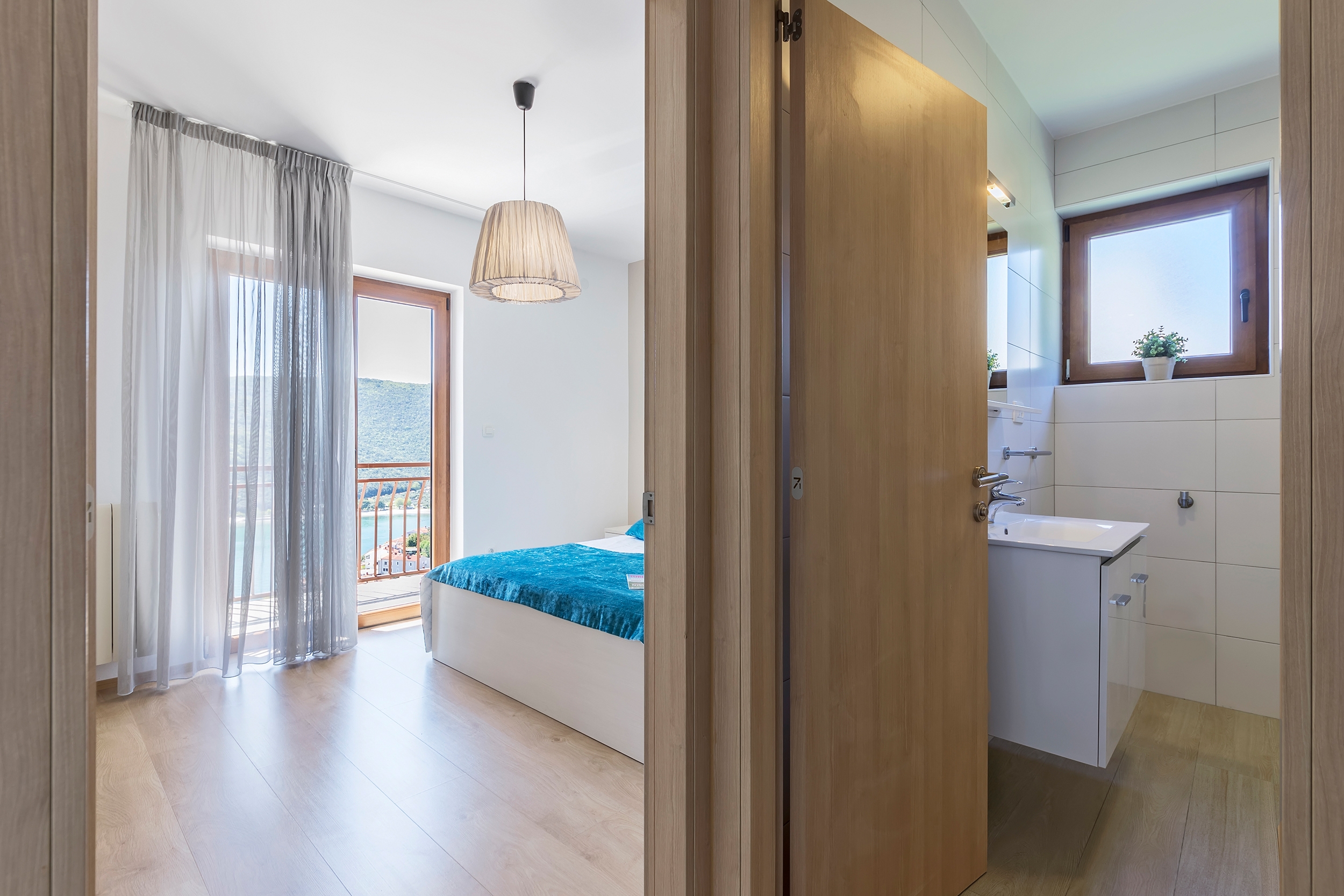Two bedroom apartment with balcony and sea view Rabac, Labin  A-b