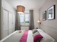 Ložnice 3 Rabac, Ložnice 3 v ubytování typu apartment, domácí mazlíčci povoleni a WiFi.