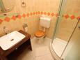 Koupelna Beli, Koupelna v ubytování typu room, domácí mazlíčci povoleni a WiFi.