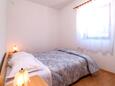 Bedroom Postira, Bedroom in the apartment, (pet friendly) and WiFi.