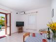 Dining room Postira, Dining room in the apartment, air condition available, (pet friendly) and WiFi.