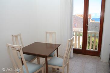 Dining room Postira, Dining room in the apartment.